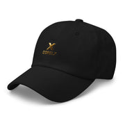 Black Corelx Dad hat with gold embroidered logo, breathable cotton fabric, curved brim, and adjustable strap for casual style and comfort